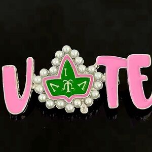 Alpha Kappa Alpha brooch. One word says it all.  Skee Wee🩷💚🩷💚